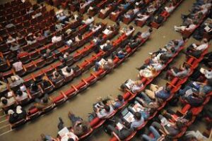 auditorium full of people sitting