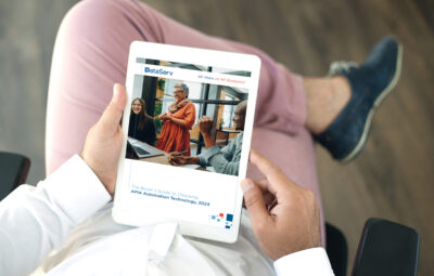 dataserv buyers guide preview on ipad held by a man in business attire
