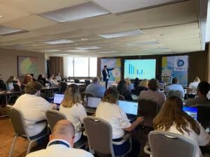 Dataserv team presenting at a conference.